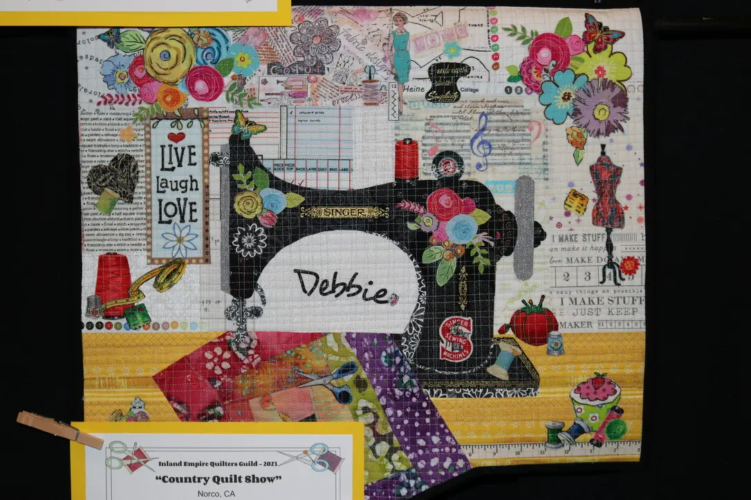 Colorful sewing machine themed fabric art